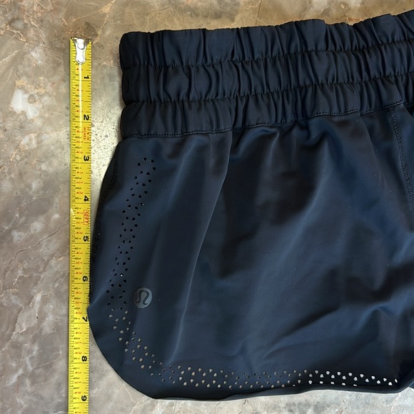 Lululemon black unlined shorts with decorative holes. Rare find! Super cute! - Picture 6 of 7